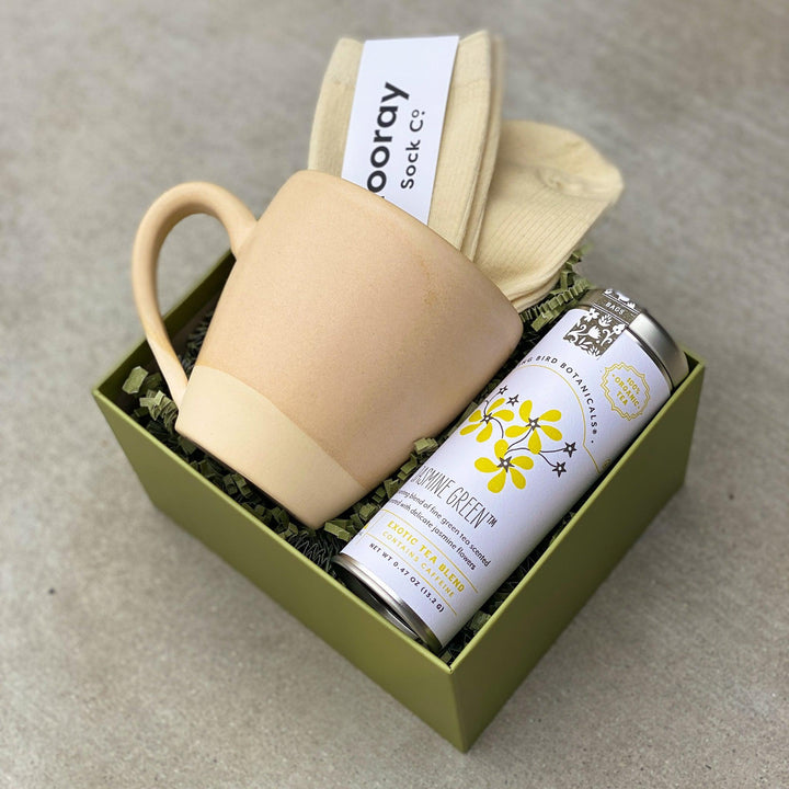 Self care gift box with mug, tea and cozy socks