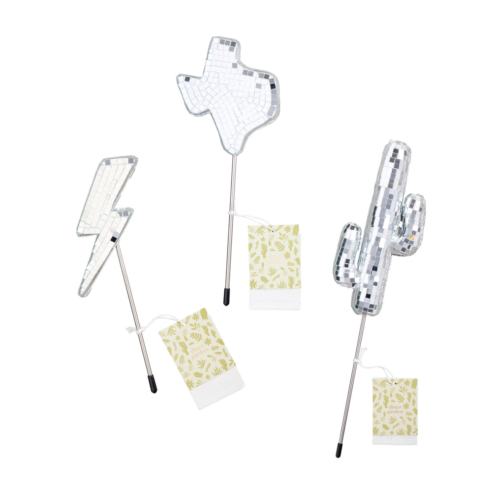 Set of decorative plant picks featuring cactus, texas state, and lightning bolt designs each with a plantable branded tag on a white background