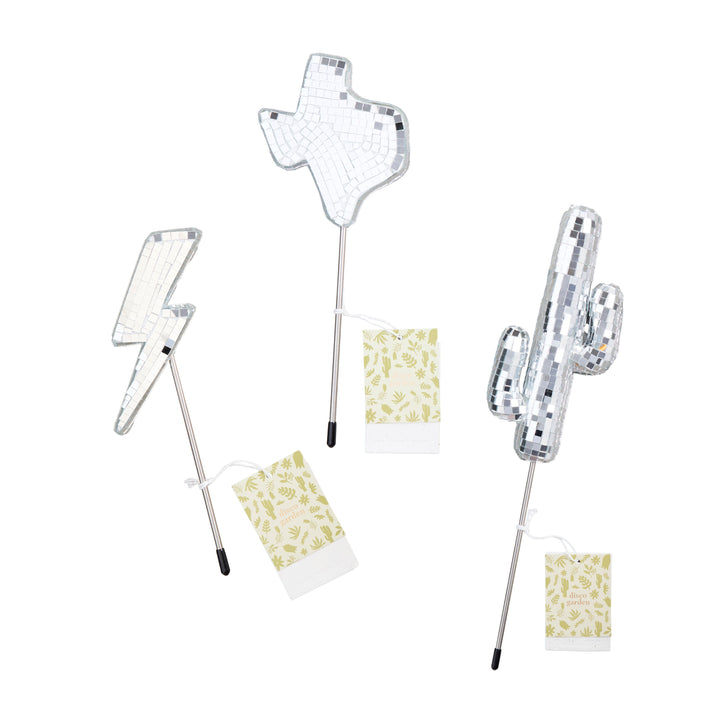 Set of decorative plant picks featuring cactus, texas state, and lightning bolt designs each with a plantable branded tag on a white background