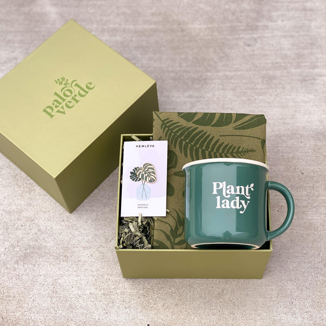 Green gift box for plant lady with pin, tea towel and mug