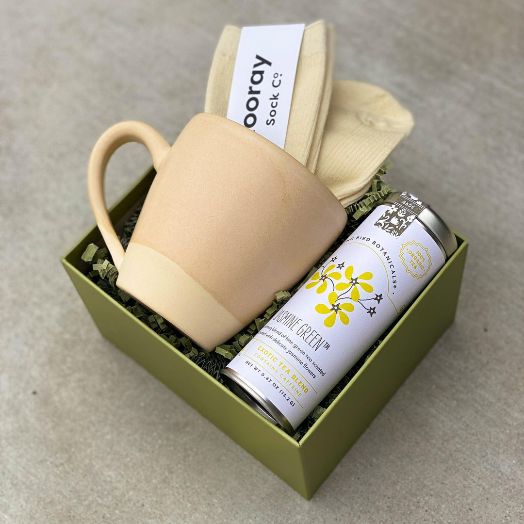 Self care gift box with mug, tea and cozy socks