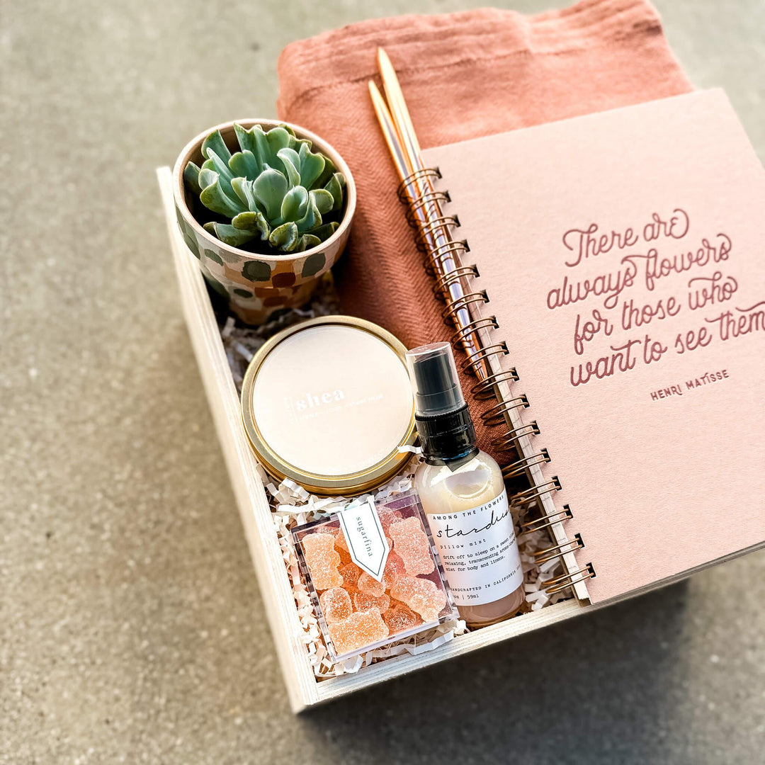Blush pink succulent gift box with self care gifts